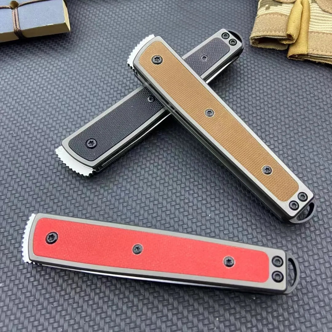 Closed and open views of a folding fruit knife with stainless steel blade in black, brown, or red handle options.