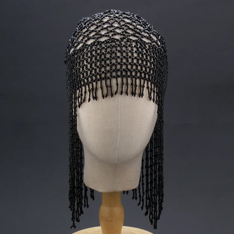 Handmade beaded alloy belly dance hat hair ornament with tassel in silver or black.