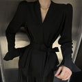 Women's French-style irregular collar tied shirt with bell sleeves in a choice of colours.