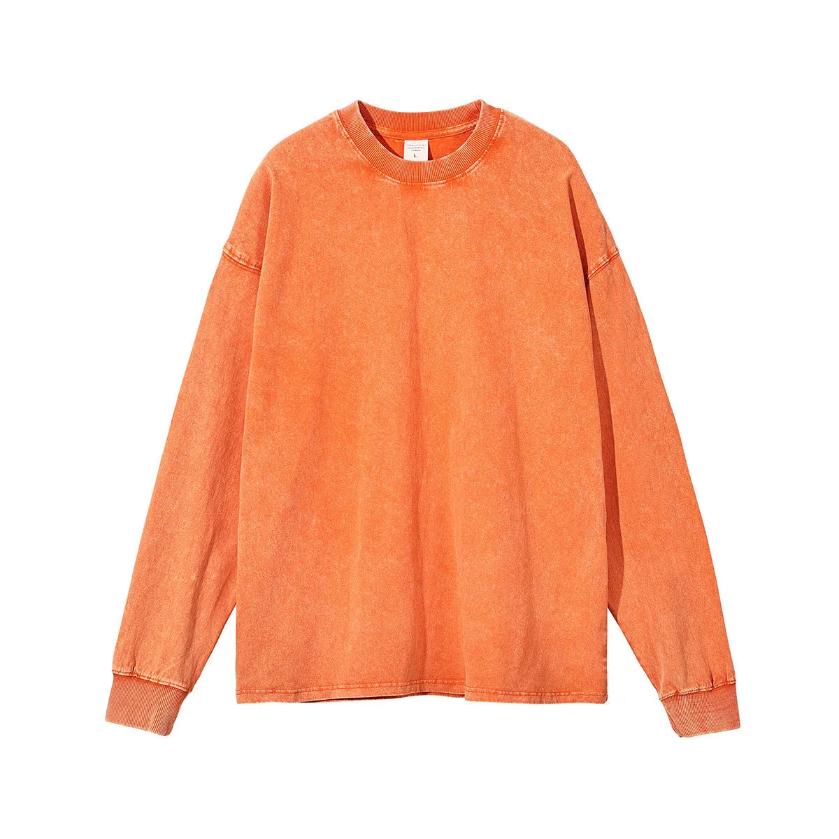 Man wearing a washed vintage style loose long sleeve cotton pullover shirt in a batik colour.
