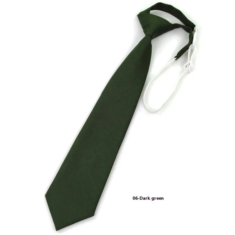 Men's navy blue cotton bow tie with arrow style on a plain background.