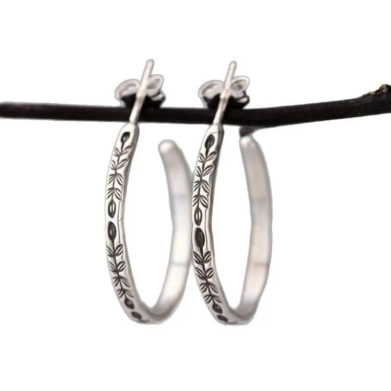 Retro botanical circle earrings in silver colour made from zinc alloy for women