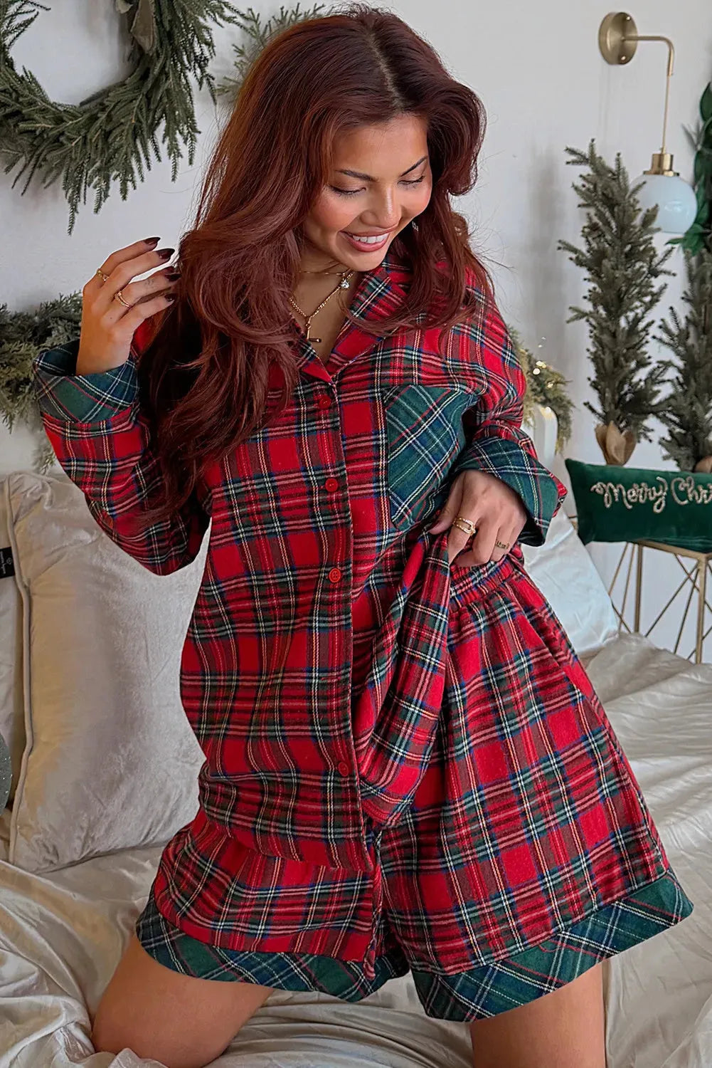 Red plaid Christmas pajama set with long sleeve shirt and matching shorts