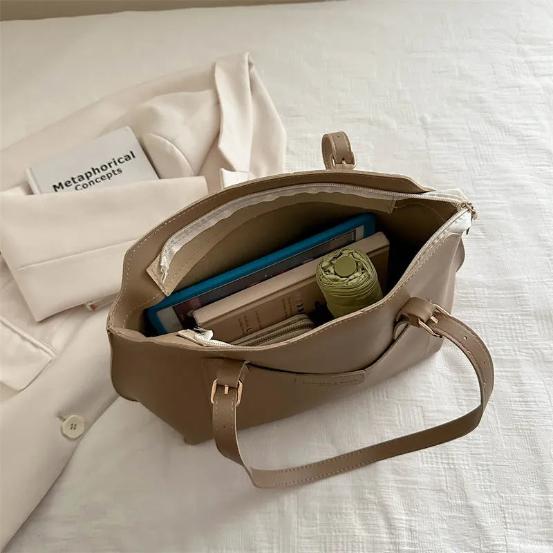 Women's PU tote bag in urban simplicity style, available in black, brown, khaki, white, with sandwich pocket and double straps