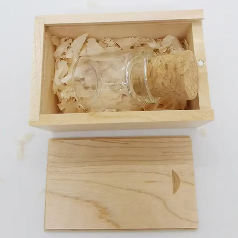 Wooden wish drift bottle shaped USB flash drive with transparent casing on display.