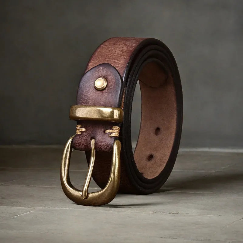 Men's black cattlehide leather casual belt with a copper pin buckle on a white background.