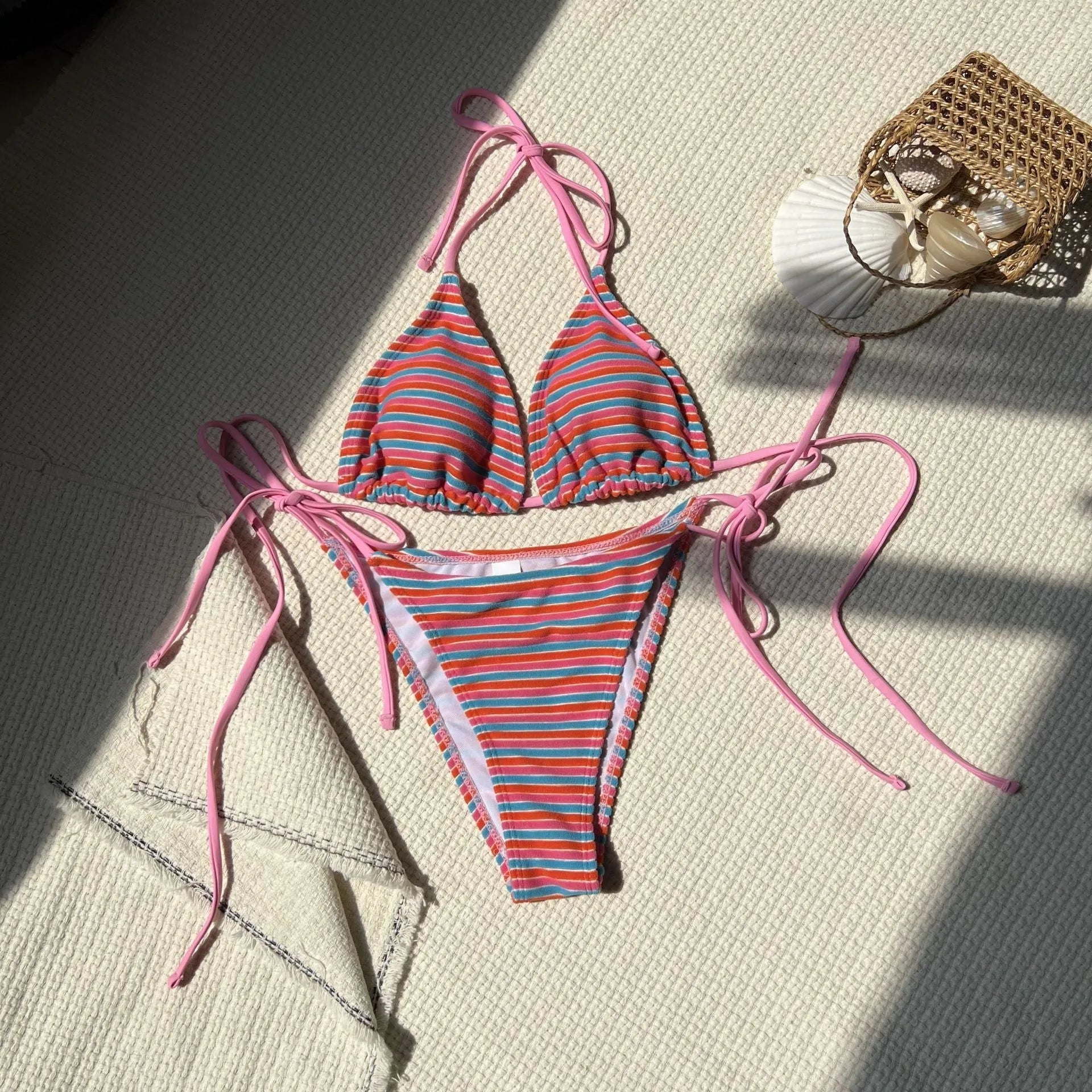 Women's striped split bikini set in polyester briefs style for swimming and wading, available in multiple colours