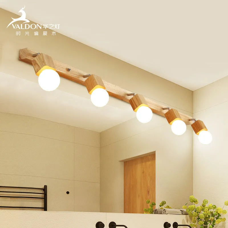 24cm round mirror finish LED wall lamp with a single light head for vanity lighting.