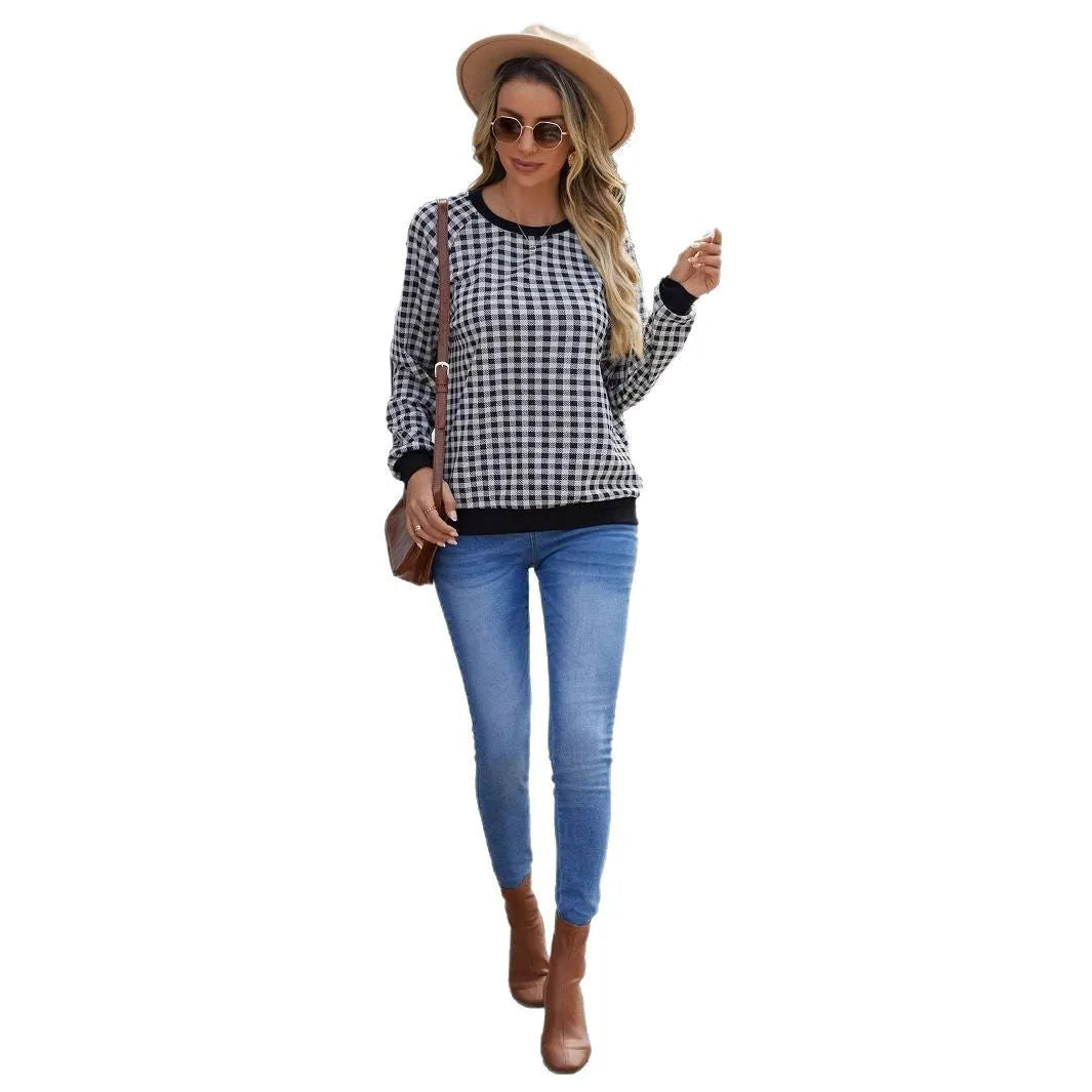 Black Japanese plaid pattern long sleeve polyester sweater showing front view with regular sleeves