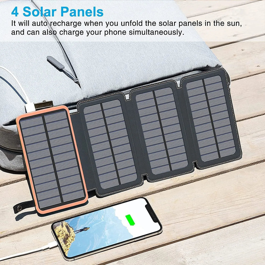 Outdoor rainproof solar phone charger with LED light in multiple colour options on a rustic surface.