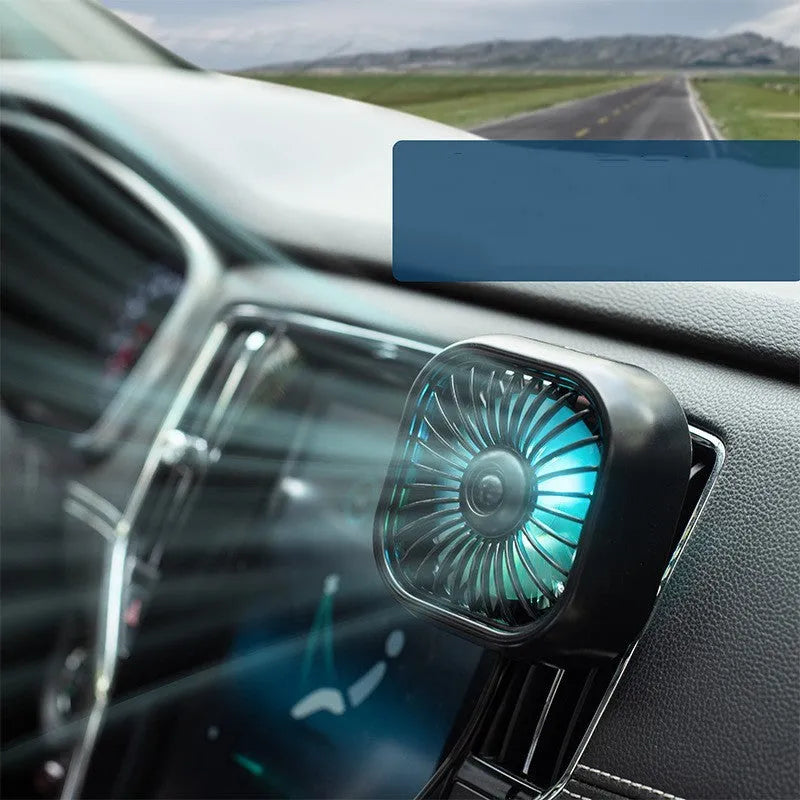 Compact black USB car fan with three speed buttons and charging cable