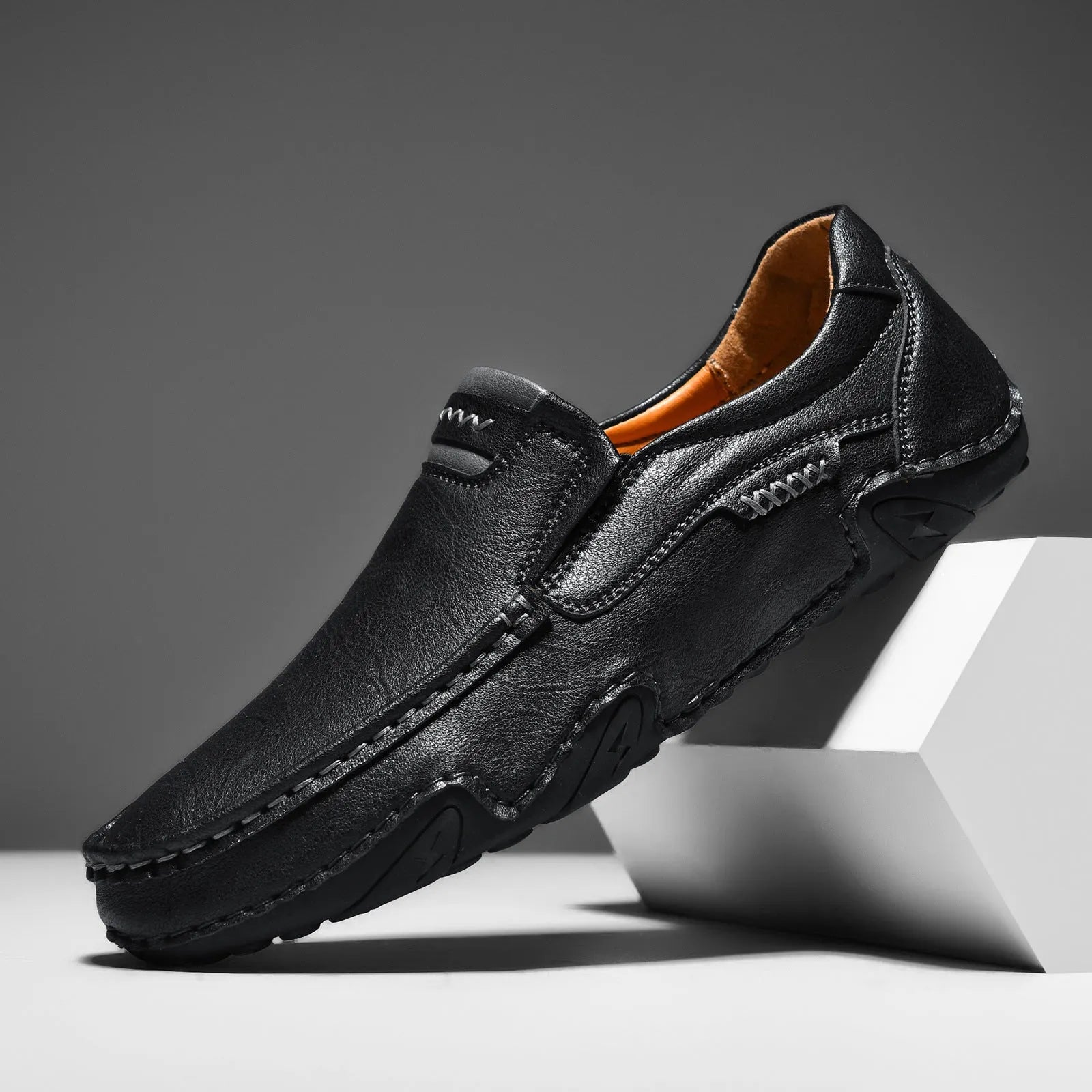 Men's casual slip-on shoes with flat rubber sole and microfiber upper in four colour options