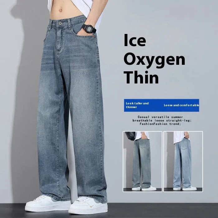 Straight-leg denim trousers in UK2560 blue with wide-leg silhouette and zip fly opening
