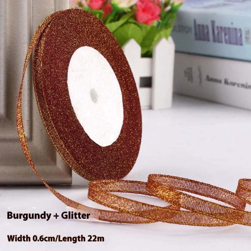 Roll of 0.6cm wide polyester gift ribbon in a choice of colours, with 22 metres per roll.