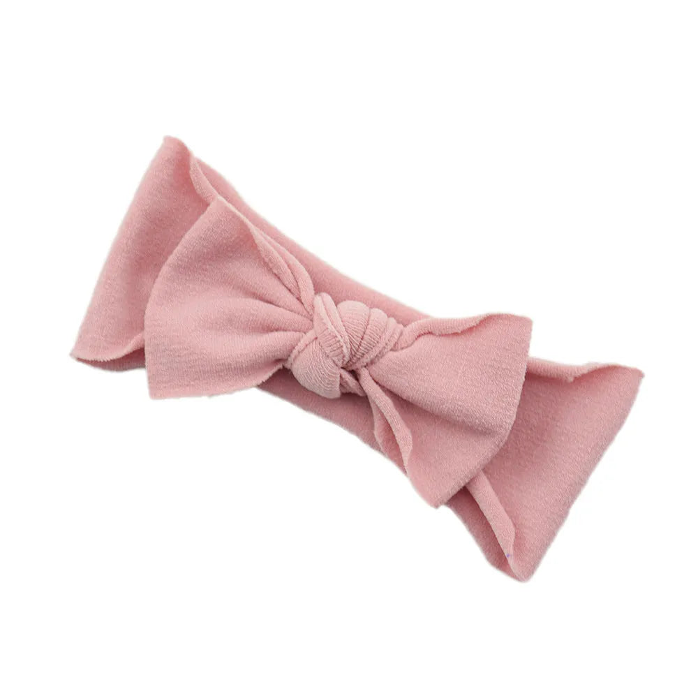 Solid colour knotted cloth headband for baby girls with bowknot design, available in 37 colours
