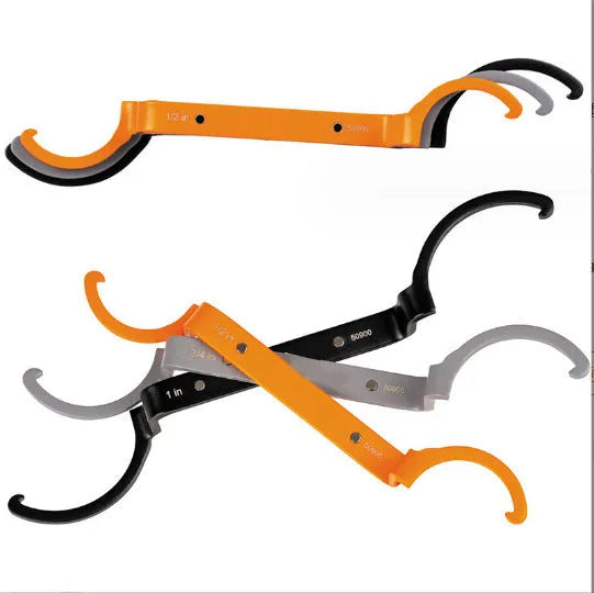 Crescent magnetic suction wrench set with orange, grey, and black adjustable spanners