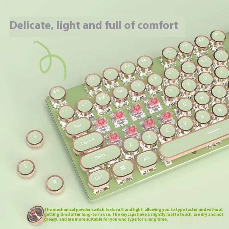 Matcha green mechanical gaming keyboard with multifunction knob on a desk