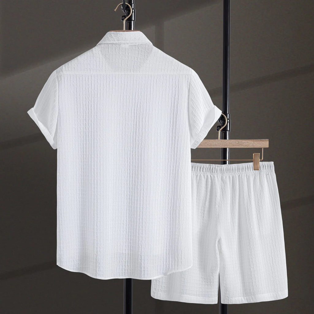 Men's white cotton blend jacquard short sleeve shirt and matching shorts laid flat
