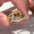 Gold women's feather ring with embossed geometric design and yellow zircon stone