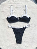 Black women's low-waist bikini swimsuit with stitch detailing and split briefs.