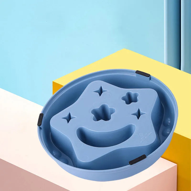 Moon Star Wings slow feeder dog bowl in blue colour with raised obstacles and anti-slip base.