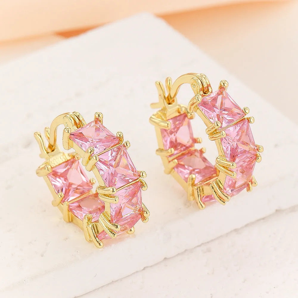 Gold-plated geometric ear ring with U-shaped design and round elements
