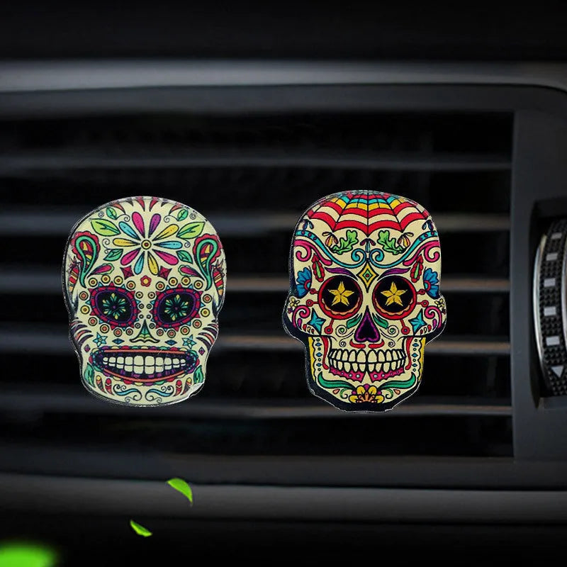 Skull-shaped acrylic car air freshener vent clip with mixed fragrance, 3.5-4.5 cm, colour option shown.