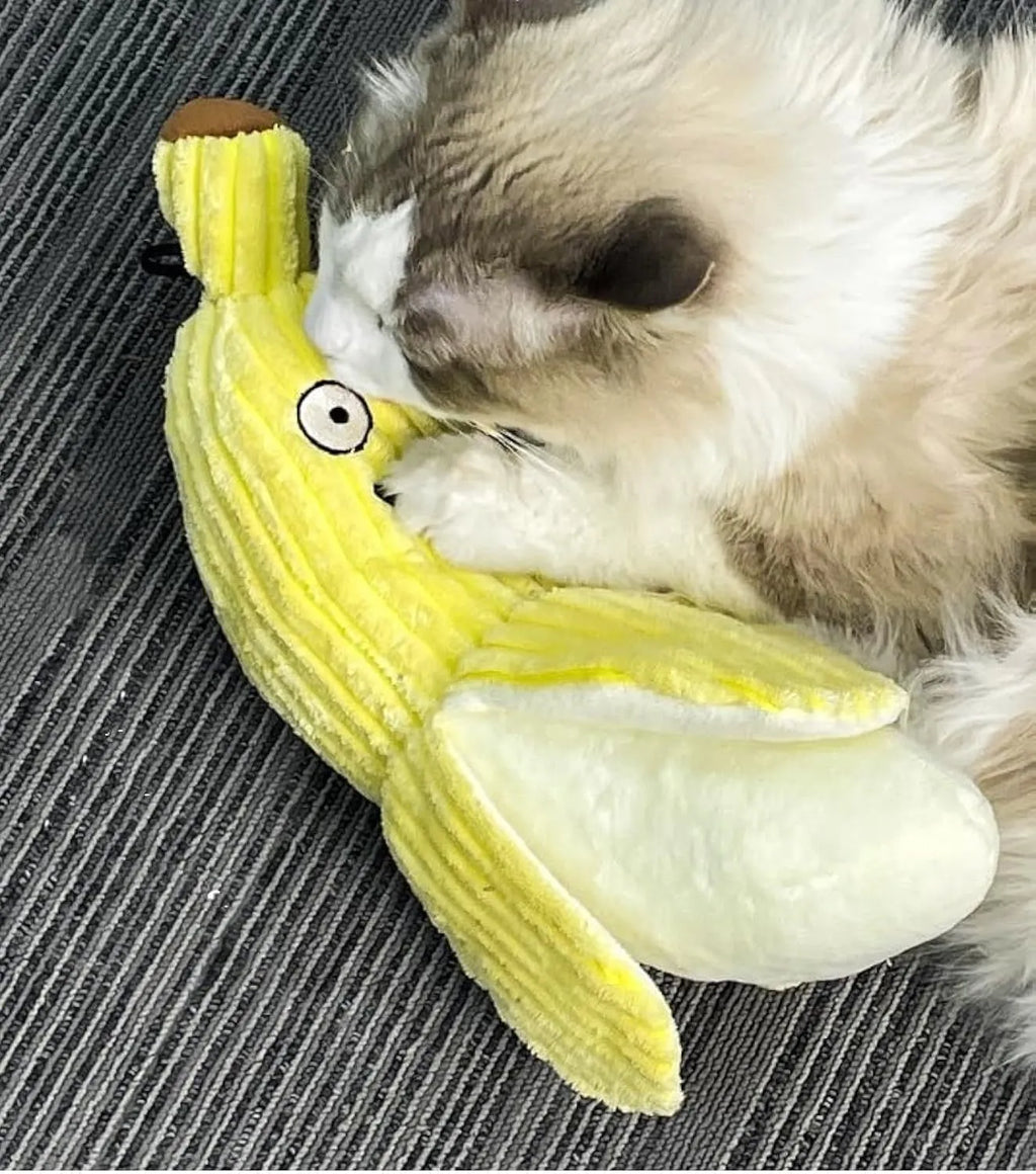Yellow banana-shaped cat toy with crinkle paper sound feature measuring 13 inches long