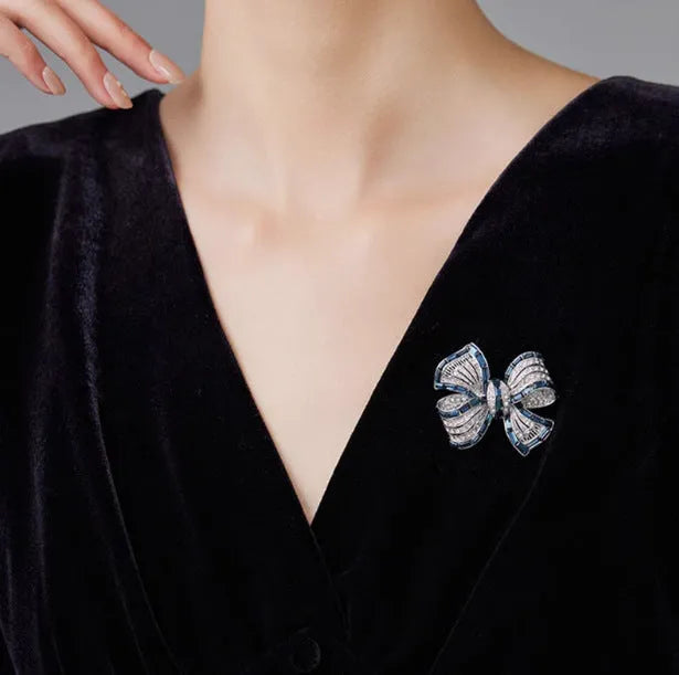 Alloy bow brooch in purplish red, blue, and purple colours for women