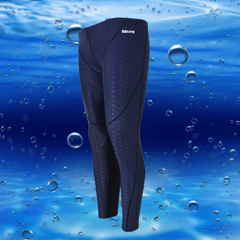 Men's black nylon cropped swimming trunks with green line detail for swimming and sports
