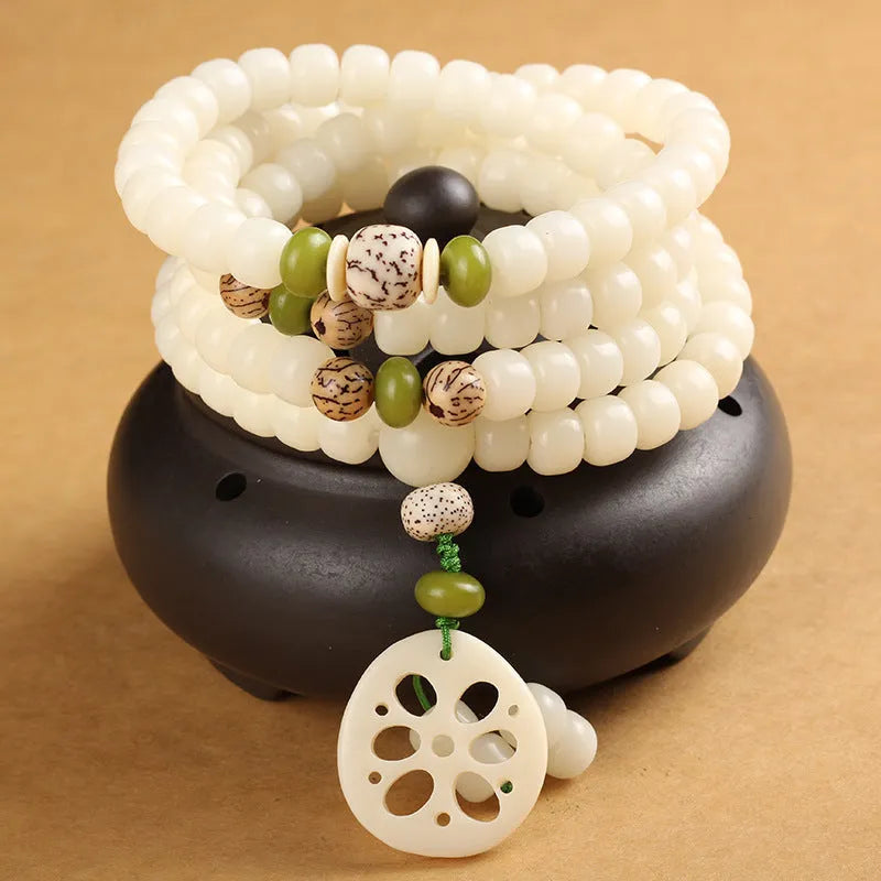 White jade Bodhi bead bracelet with 6x8mm beads in multiple design styles