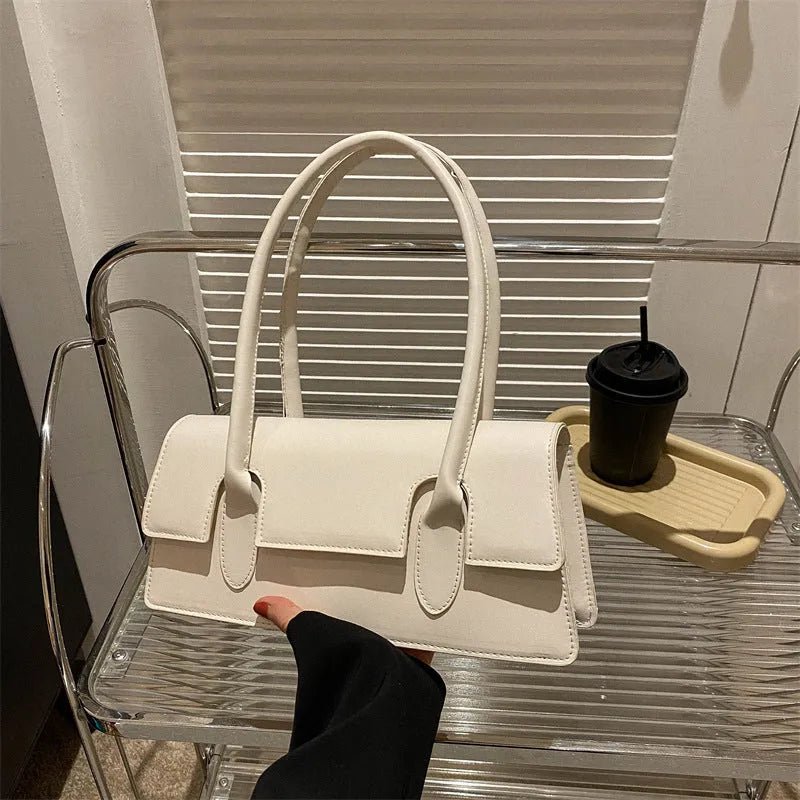 Women's small square shoulder bag in PU leather with document compartment interior and sandwich pocket exterior