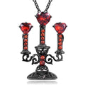 Close-up of a Gothic zinc alloy clavicle chain with a detailed hollow candlestick pendant on a cross chain.