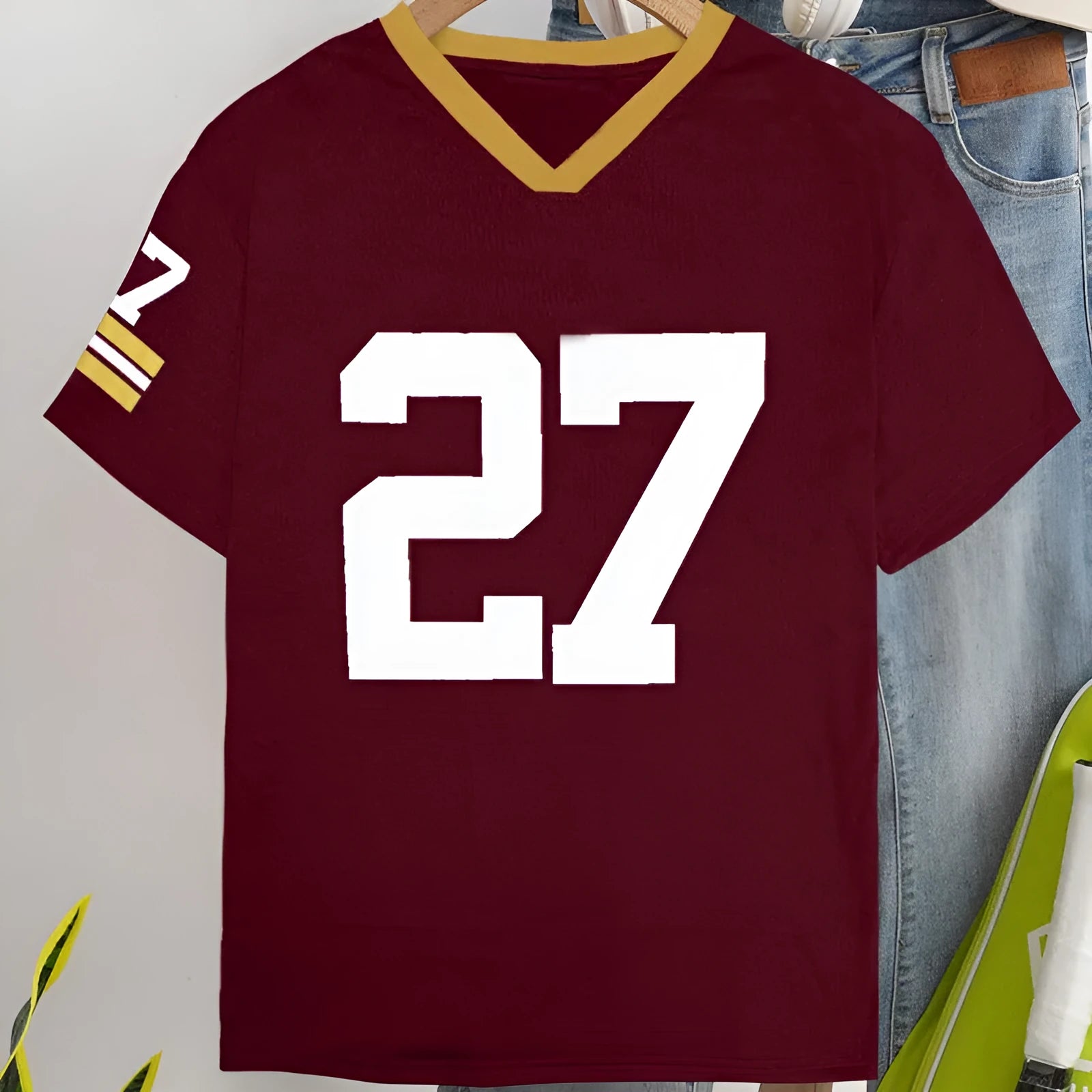 Red loose-fit cotton t-shirt with white digital letter print on the front.