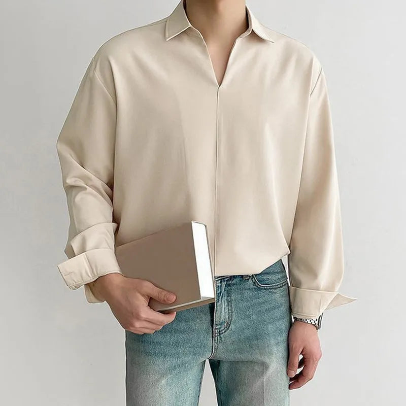 Men's loose lapels casual shirt in polyester blend fabric showing non-ironing construction and pullover style