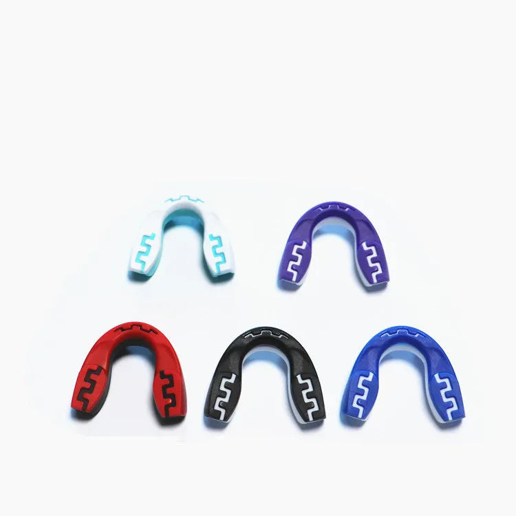 Adult boxing mouthguard with tooth socket design in black and white printed teeth pattern