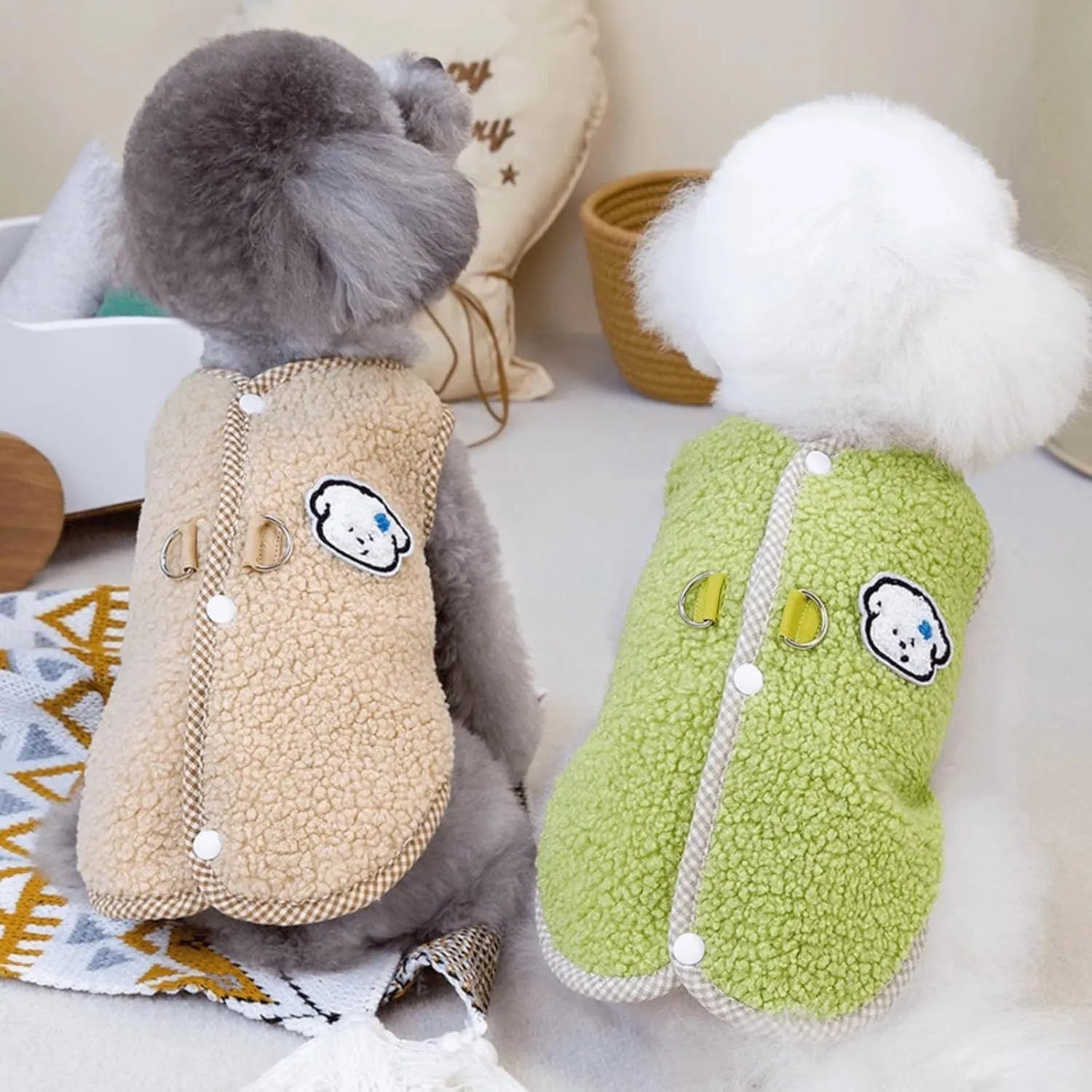 Green coral fleece dog vest with a metal leash ring on the back, shown on a small dog.