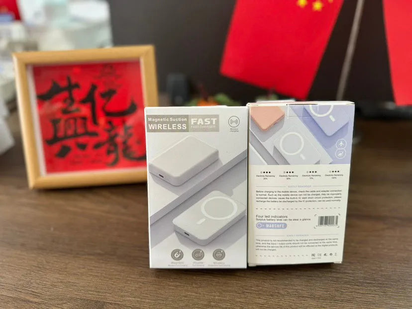 Magnetic wireless charging power bank in white with creative foot design showing charging surface