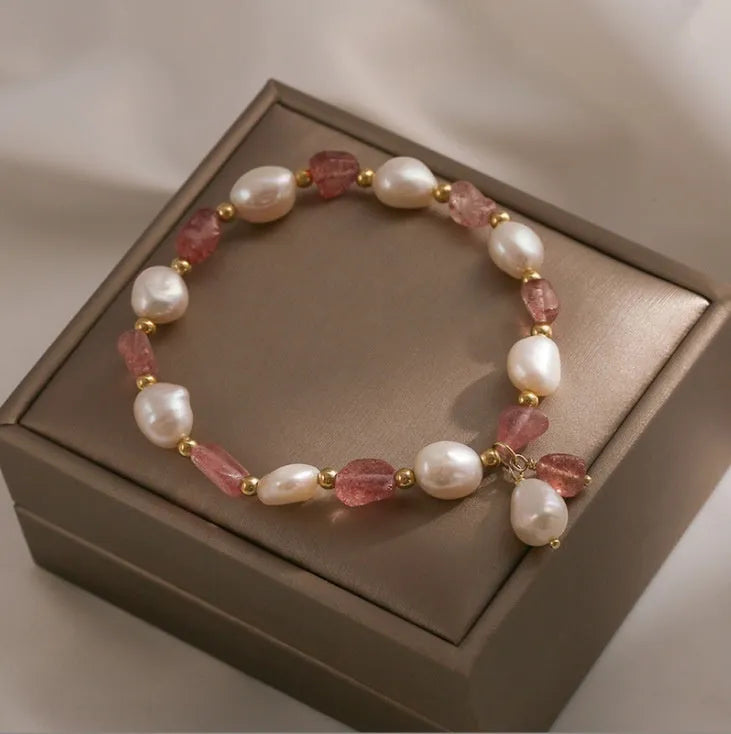 Hetian jade and strawberry quartz crystal bracelet for women showing manual craftsmanship and natural stone variations