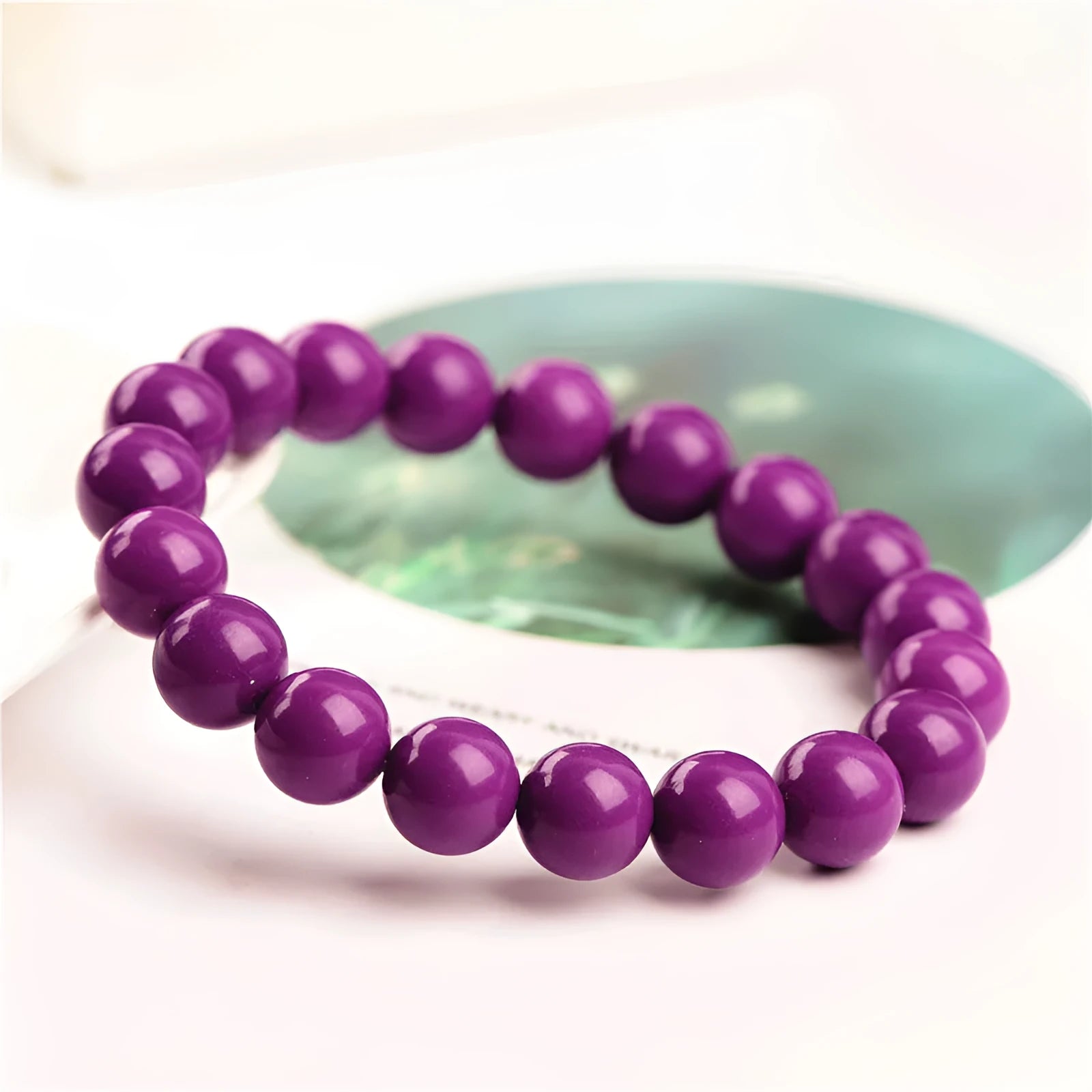 Jiuya purple mica crystal bracelet with polished beads in 5A grade, showing single circle design.