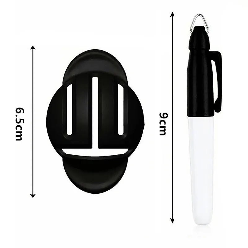 Plastic golf putter alignment scriber tool set with drawing pens on a putting green.