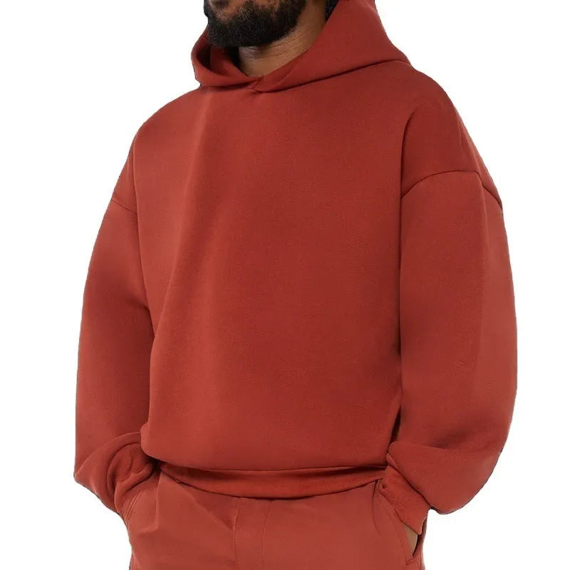 Men's solid colour fleece-lined cotton hoodie sweater with a pullover design and wool lining.