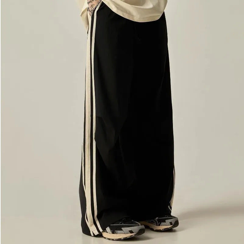 Black wide leg climbing trousers with high waist and straight-leg design