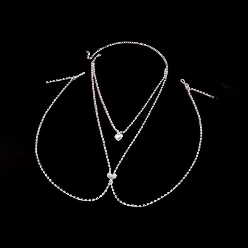 Women's rhinestone body chain with heart shape in gold or silver colour with electroplated finish