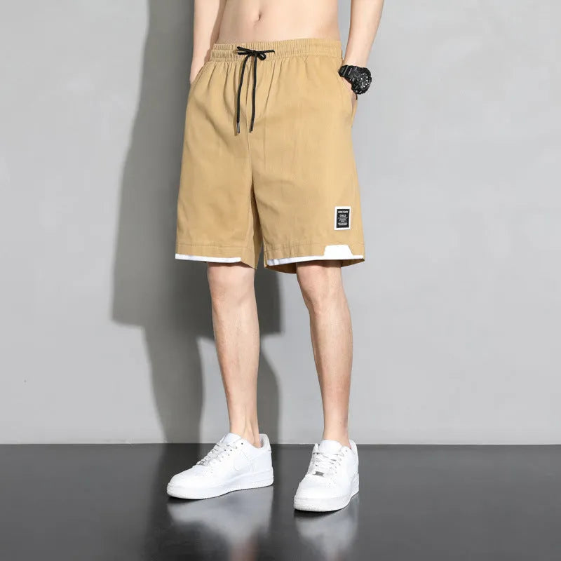 Boys cotton shorts in black, khaki, or white, shown in a loose-fitting Japanese style for summer.