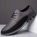 Men's casual low-top leather shoes with a fabric upper, leather toe cap, and rubber sole.