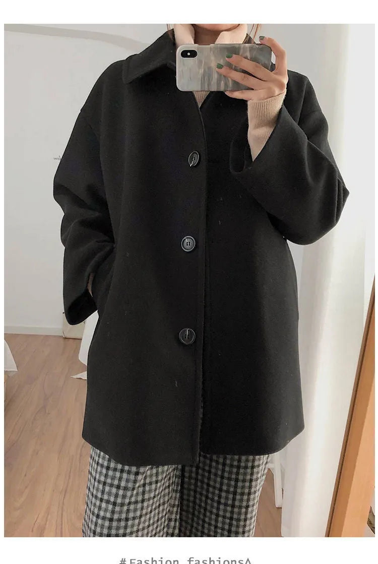 Women's Korean-style loose mid-length solid colour overcoat in black with long sleeves