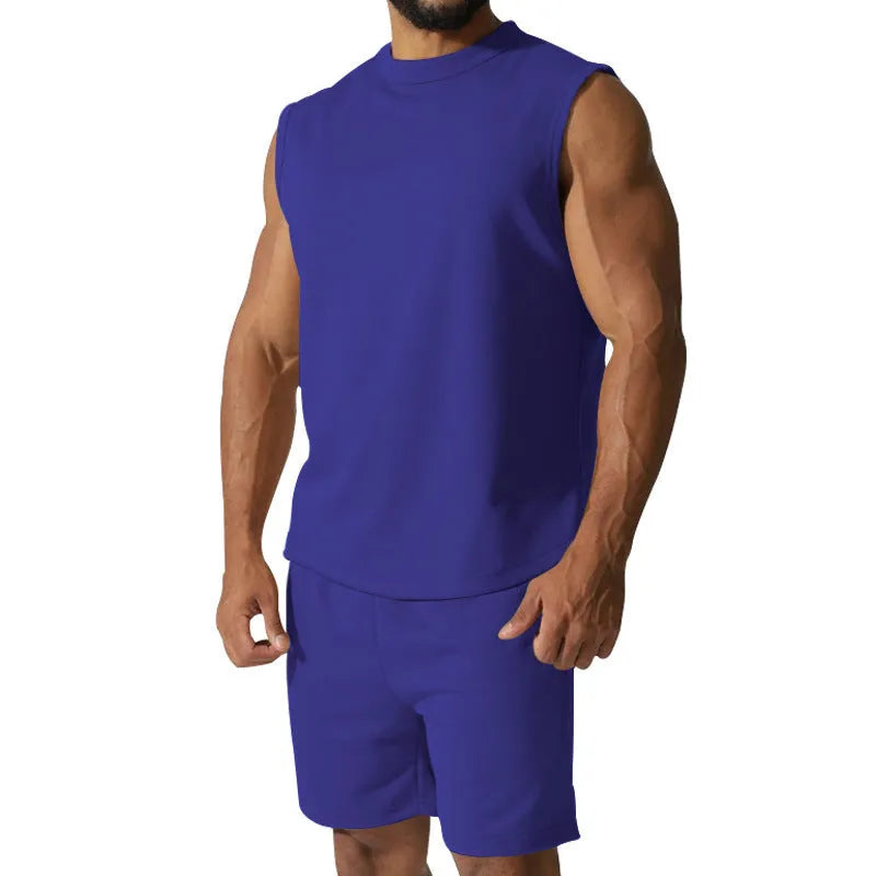 Men's sleeveless cotton blend sports suit showing sleeveless top and matching shorts in a solid colour.
