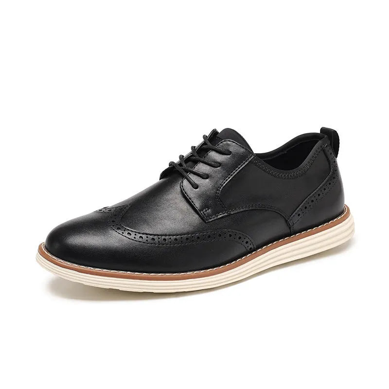 Men's black slip-on business casual shoes with decorative carving details on PU leather upper