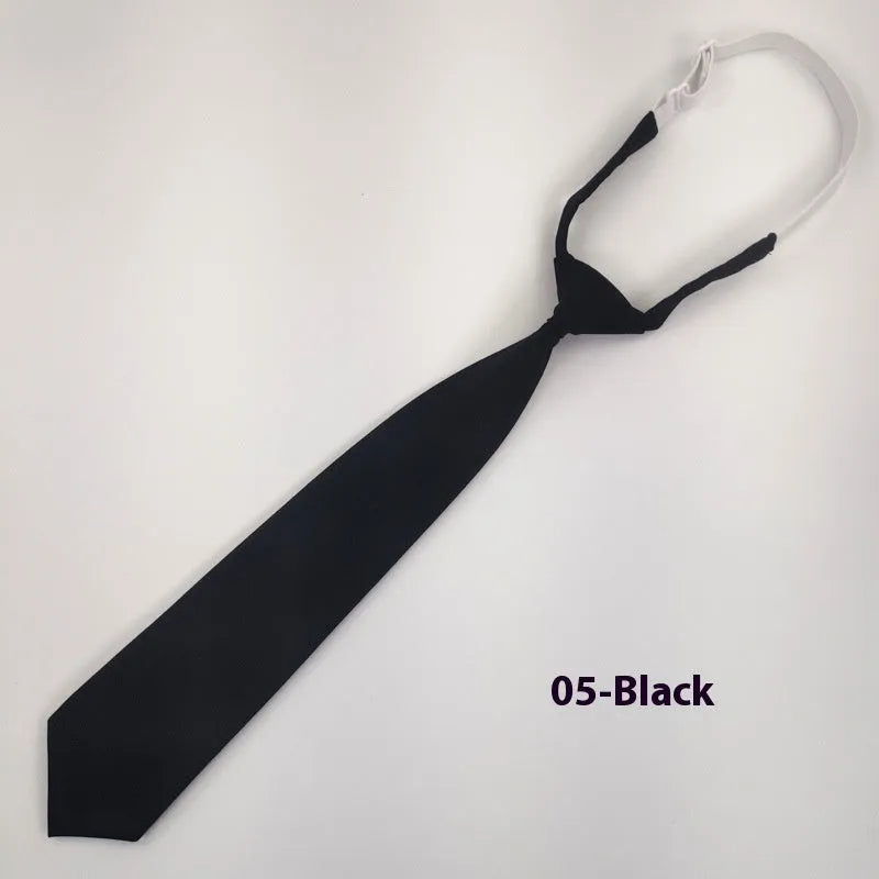 Men's navy blue cotton bow tie with arrow style on a plain background.